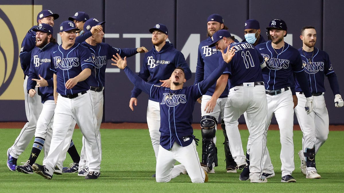 The Rays celebrate their walk-off win against the Dodgers.