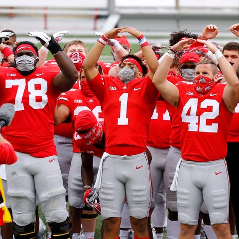 Justin Fields, No. 1, teammate celebrate Ohio Stat