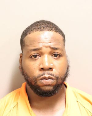 Michael Leslie Brooks Jr., charged with first-degree robbery, allegedly wielded an ax to rob a man of $40.
