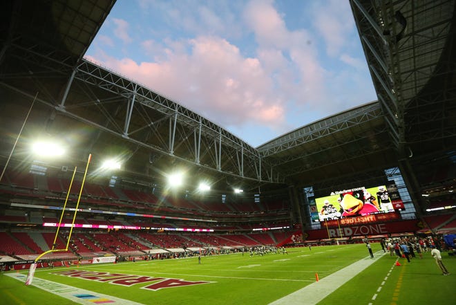 The roof is opened for NFL action between the Arizona Cardinals and the Seattle Seahawks at State Farm Stadium in Glendale, Ariz. Oct. 25, 2020