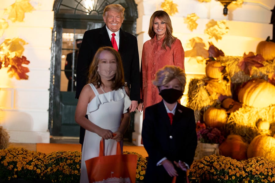 President Donald Trump and First Lady Melania Trump great guests on the south lawn of the White House on Oct. 25, 2020, in Washington, DC. To ensure the health and safety of guests and staff during the Halloween festivities, extra measures such as facemasks, social distancing, and hand-sanitizer were put in place.
