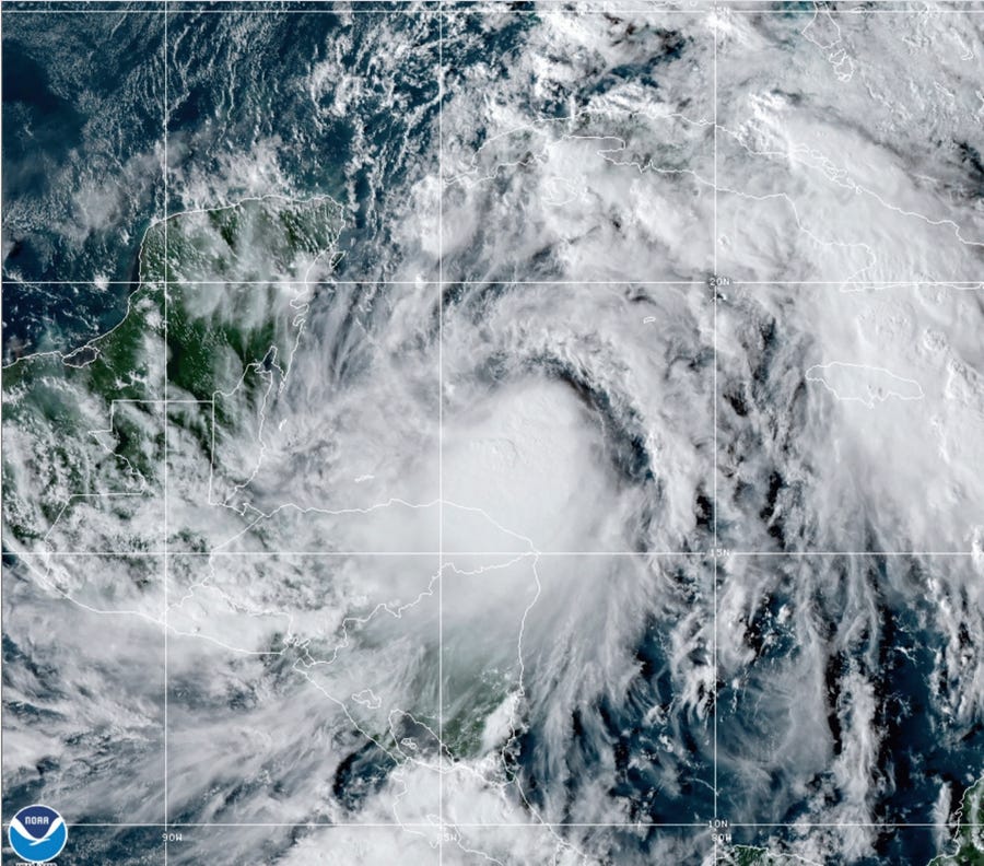 This satellite image provided by the National Oceanic and Atmospheric Administration shows Tropical Storm Zeta, Sunday, Oct. 25, 2020, at 2110 GMT (5:10 p.m. ET).