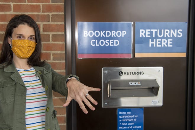 Julie Travis of Worthington lost a diamond from her wedding ring when she snagged it on a book-return drop box Sept. 29 at Worthington Park Library.