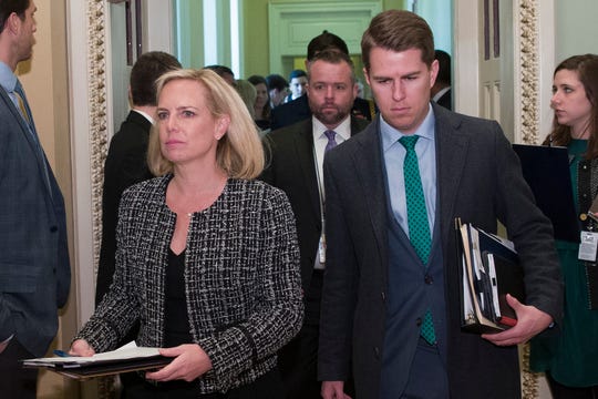 In this March 5, 2019, file photo, Homeland Security Secretary Kirstjen Nielsen and then-Department of Homeland Security chief of staff Miles Taylor, right, depart after the Republican Caucus luncheon, at the U.S. Capitol in Washington. Taylor who penned a scathing anti-Trump op-ed and book under the pen name ÒAnonymousÓ made his identify public Wednesday, Oct. 28, 2020.