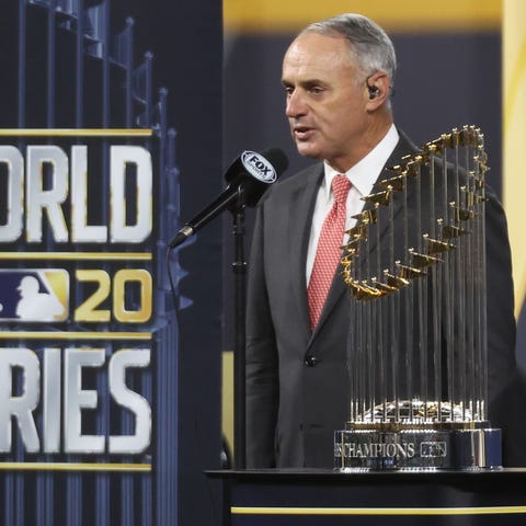 Rob Manfred presents the Commissioner's Trophy aft