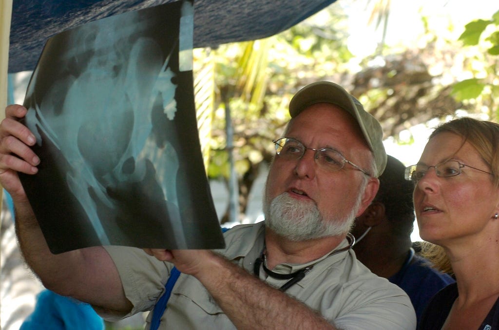 Dr. Robert Redfield, CDC director, while at the Institute of Human Virology at the University of Maryland School of Medicine. Here in Haiti after an earthquake in 2010.