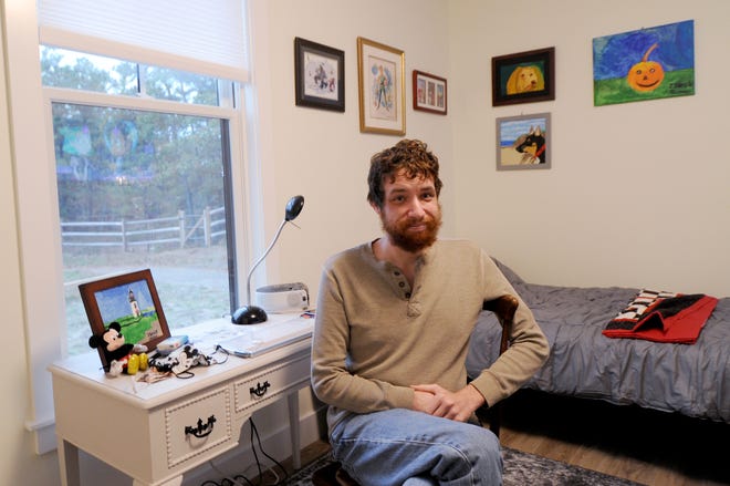 Patrick Ohman has moved into his new unit at FORWARD at the Rock, a Dennis complex that provides housing for young adults with autism or related disabilities. His mother, Kathy, was one of the driving forces behind the project.