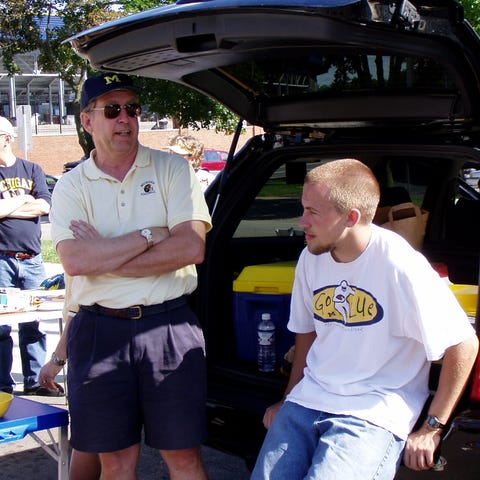 John Levinson (left) has been to every Michigan ho