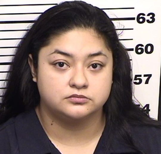 Gabriella Gauna was charged with embezzlement of money and materials from a Carlsbad home improvement store, police said.