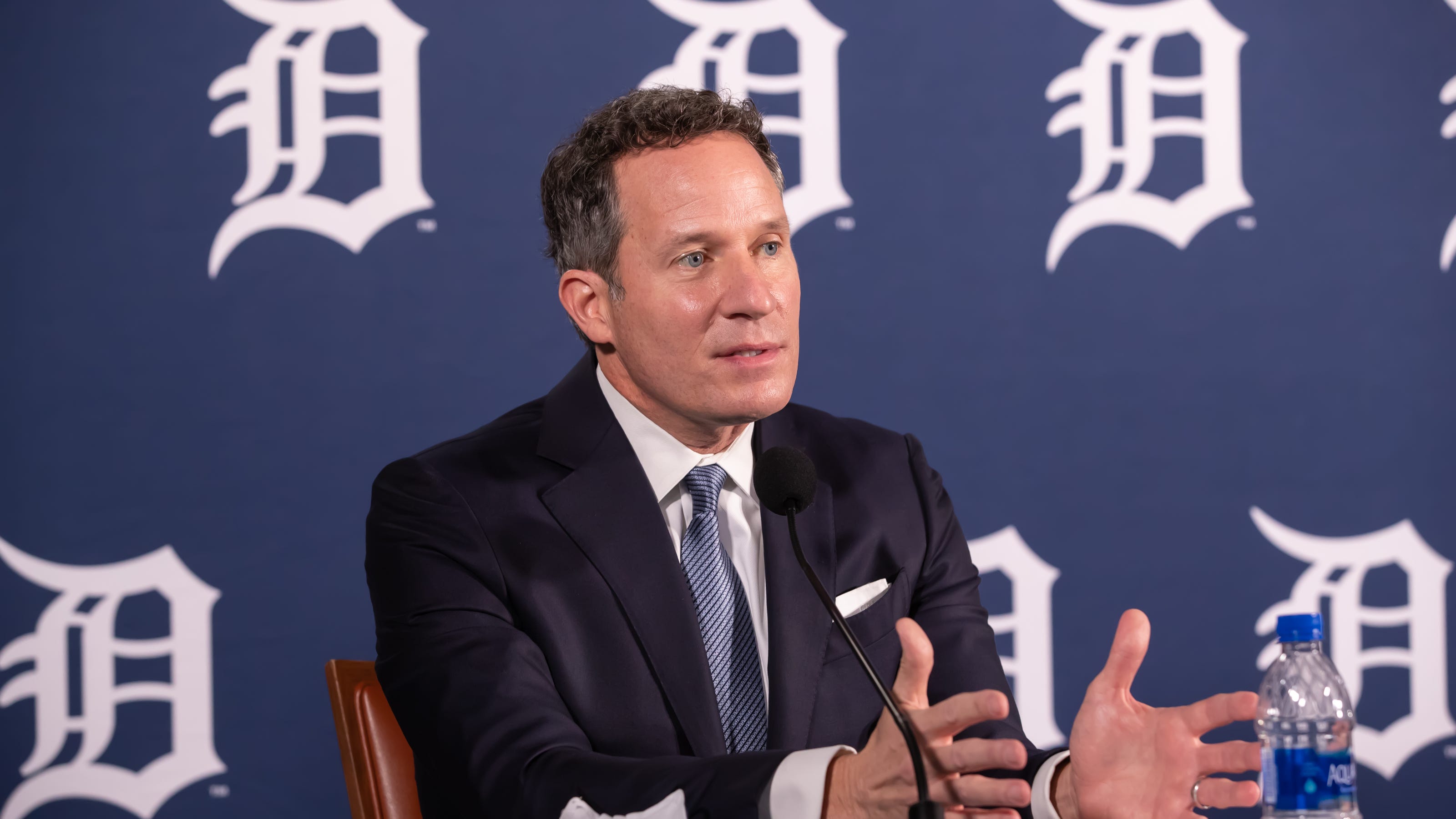 Detroit Tigers owner Christopher Ilitch talks fans at Comerica Park