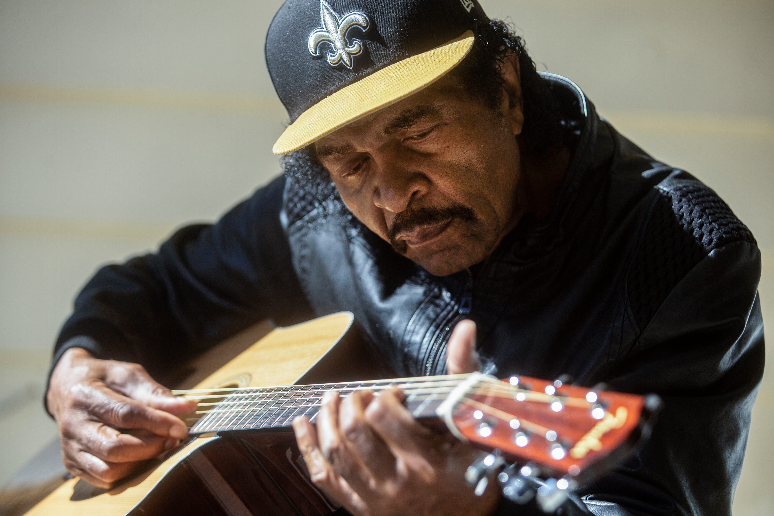 Bobby Rush plays music on his front porch in Jackson, Miss. Friday, Oct. 30, 2020.