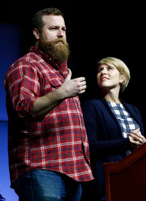 Ben Napier, left, and his wife Erin, star in the HGTV home renovation series, "Home Town," based in their hometown of Laurel, Mississippi. (AP Photo/Rogelio V. Solis)