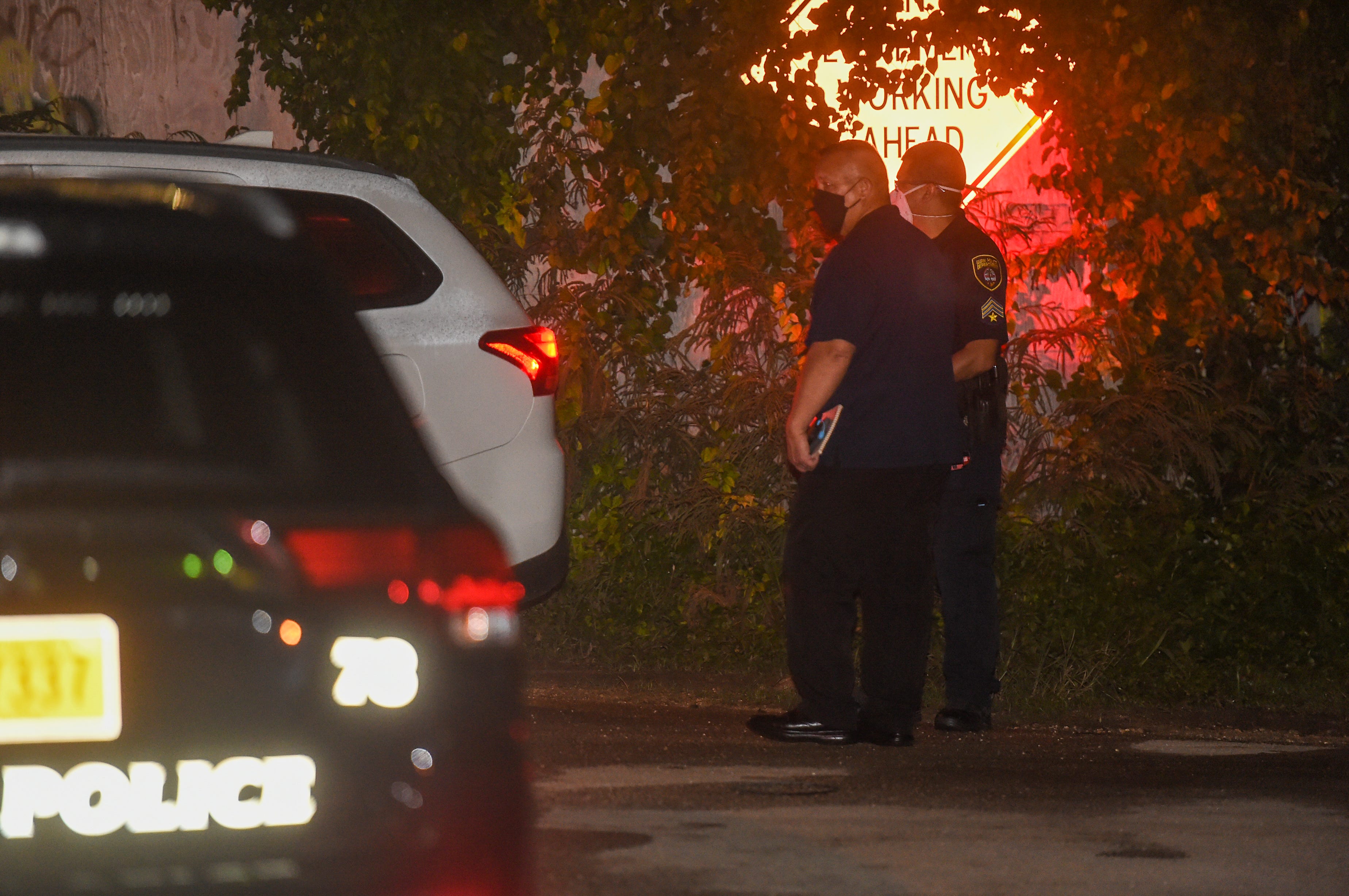 Guam Police Department officers convene at scene of an officer-involved shooting on Bonito Street in Tamuning, Nov. 4, 2020.