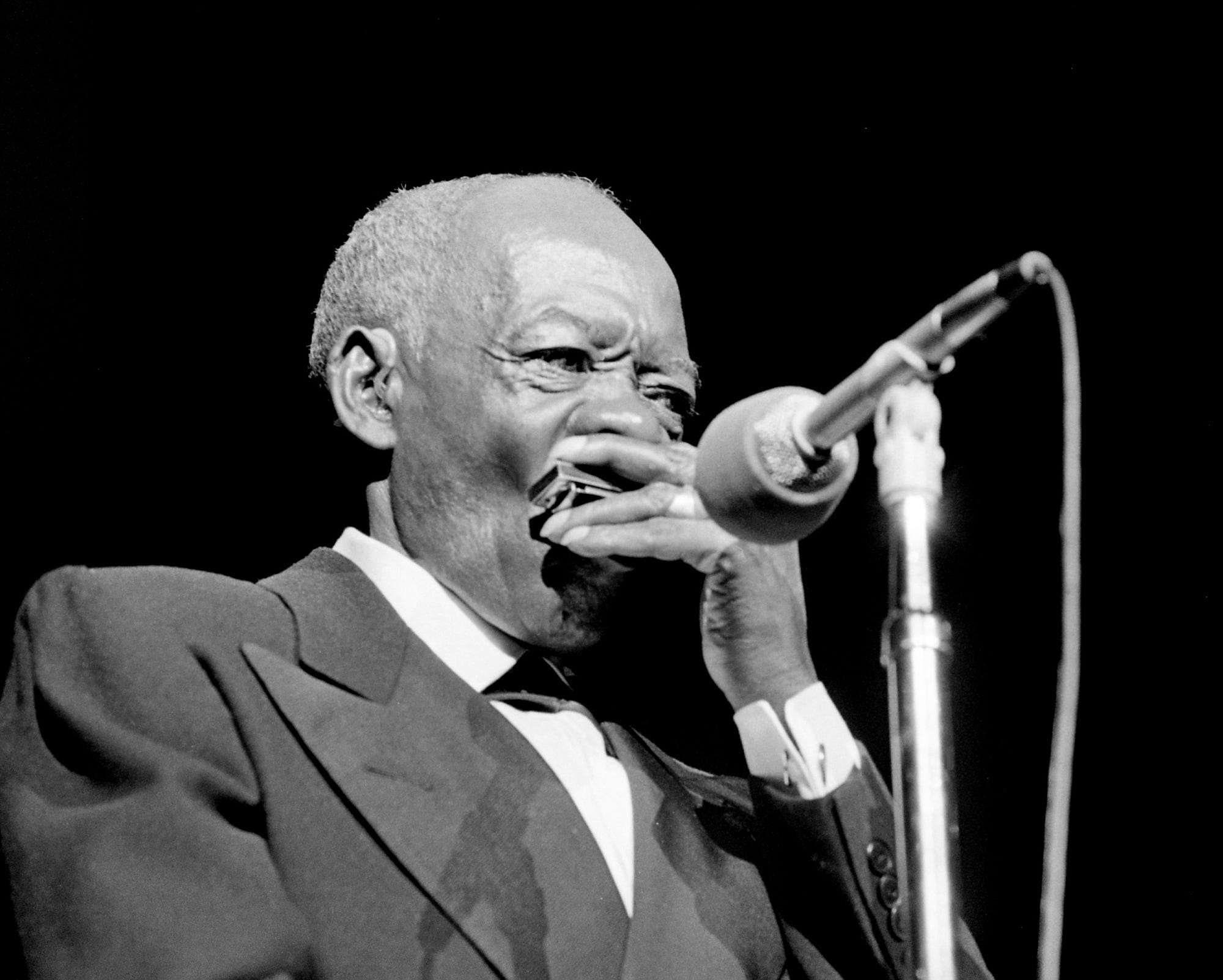 Veteran harmonica player DeFord Bailey makes his Grand Ole Opry House debut Dec. 14, 1974 with "It Ain't Gonna Rain No More," "The Pan American Blues" and "Fox Chase."