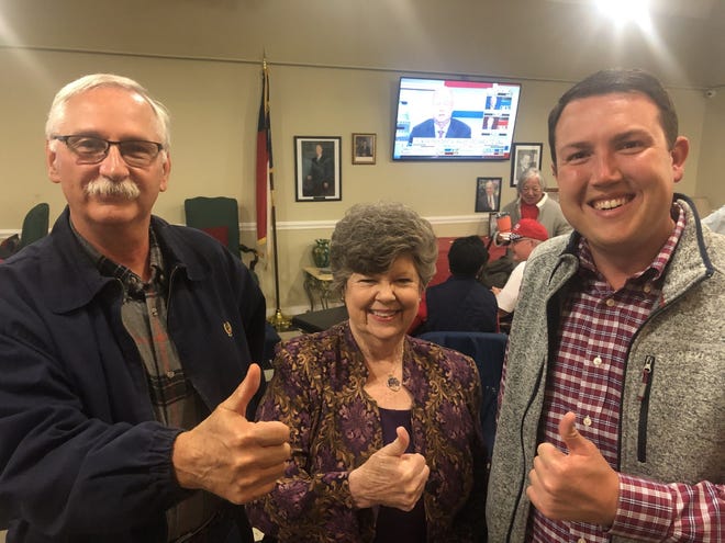 NC Reps. Allen McNeill, left, and Pat Hurley, center, celebrate Tuesday's night's victory with NC Senator Dave Craven from Republican HQ in downtown Asheboro.