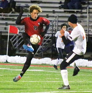 North Pocono’s Alex Pagotto (15) mounts a strike against Tunkhannock during the District Two Class AAA quarterfinals. The Trojan junior notched a hat trick versus the Tigers helping push his team to a 12-0 victory Monday night in Moscow.