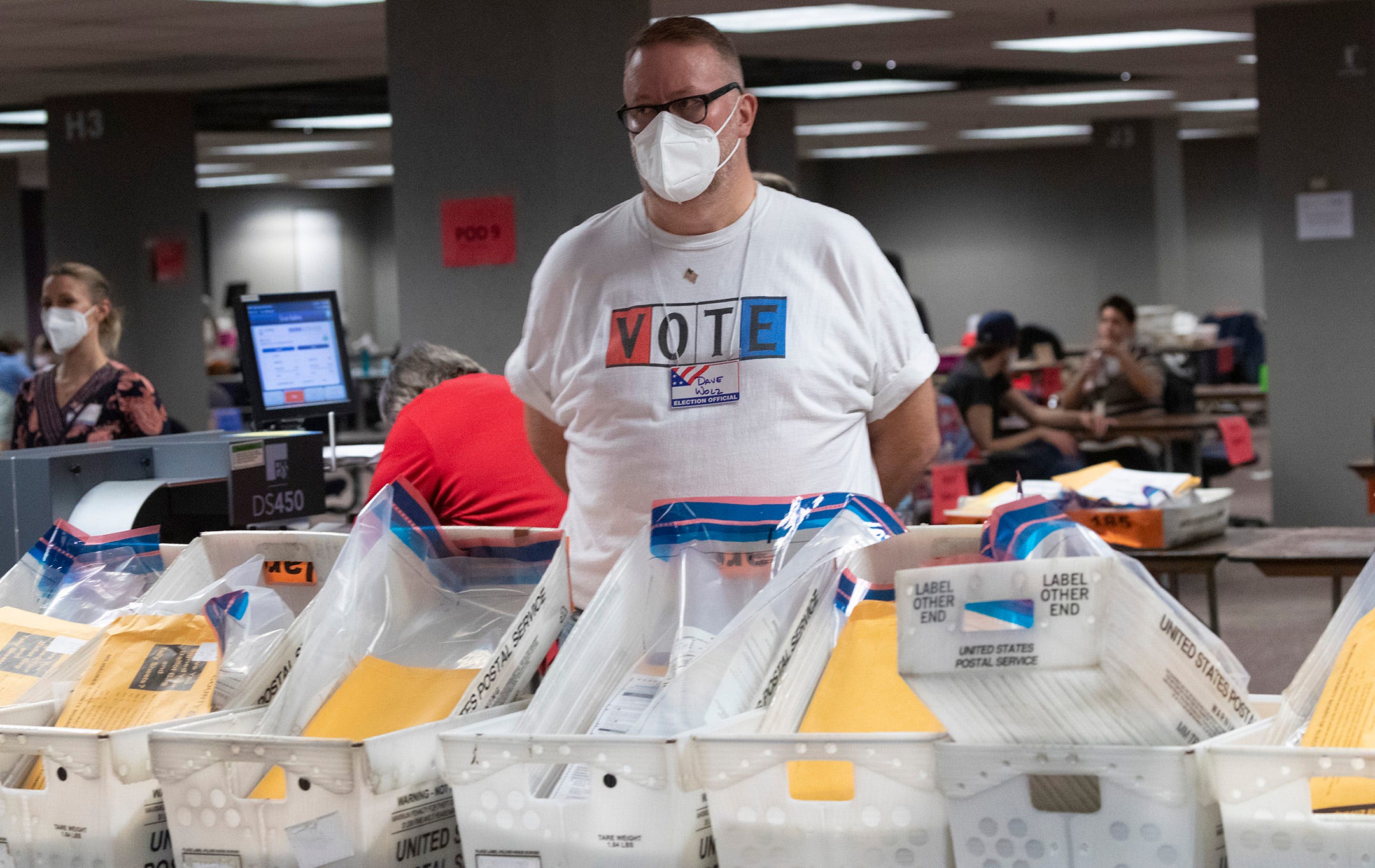 Workers process ballots Tuesday at the City of Milwaukee Central Count Facility, 501 W. Michigan Ave. Split into three shifts, tabulators are positioned in pods of around 50 people to limit the amount of interaction among the hundreds working there because of the coronavirus.