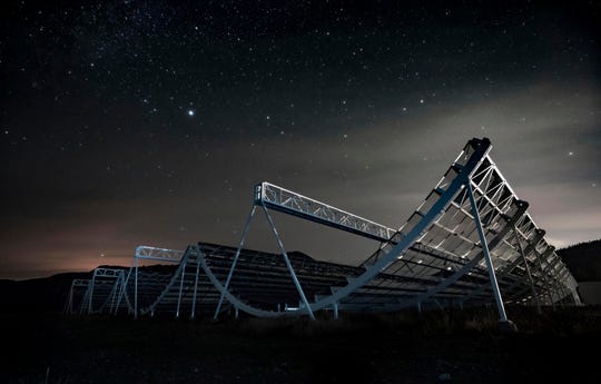 A file photo provided by the Canadian Hydrogen Intensity Mapping Experiment collaboration shows the CHIME radio telescope in Kaleden, British Columbia, Canada. On Wednesday, Nov. 4, 2020, astronomers say they used the instrument to trace an April 2020 fast radio burst to our own galaxy and a type of powerful energetic young star called a magnetar.