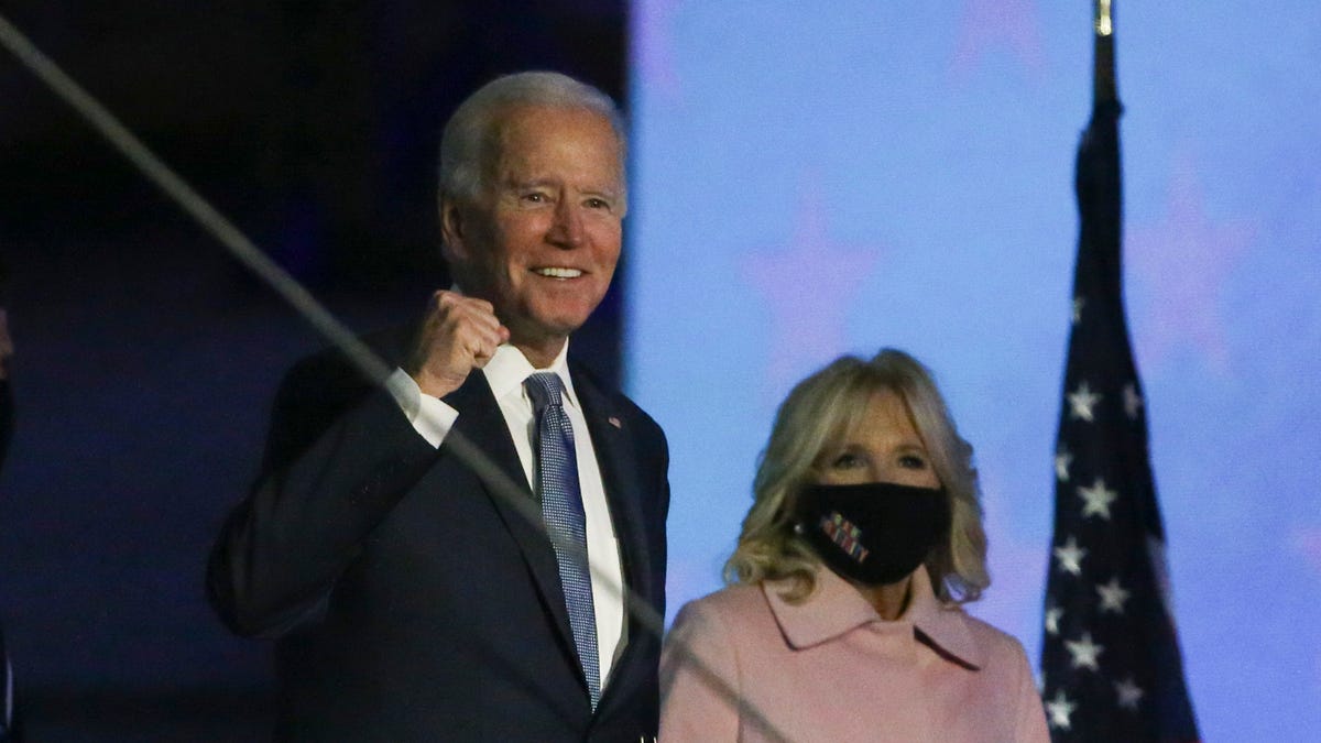 Joe Biden and wife Jill greet supporters outside the Chase Center on Riverfront as the results of the presidential election remain unclear early Wednesday in Wilmington, DE.