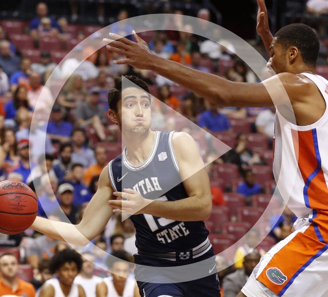 Utah State transfer Abel Porter (15), shown here in a game last December against Florida, was expected to play significant minutes in his final season, at Ohio State.