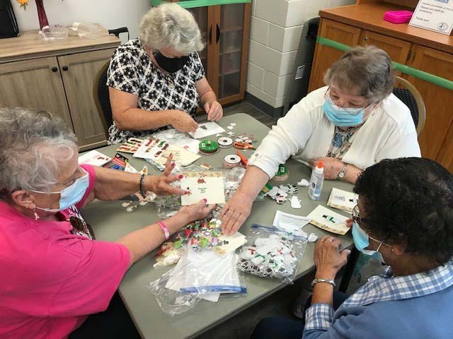 Members of the Adult Services Program at Jacksonville Recreation and Parks gather each year to assemble handmade cards that are sent to military personnel that are deployed. This is an annual tradition and one of the many activities offered at Jacksonville Commons Adult Center. For more information, visit https://jacksonvillenc.gov/486/Adult-Programs-Day-Trips