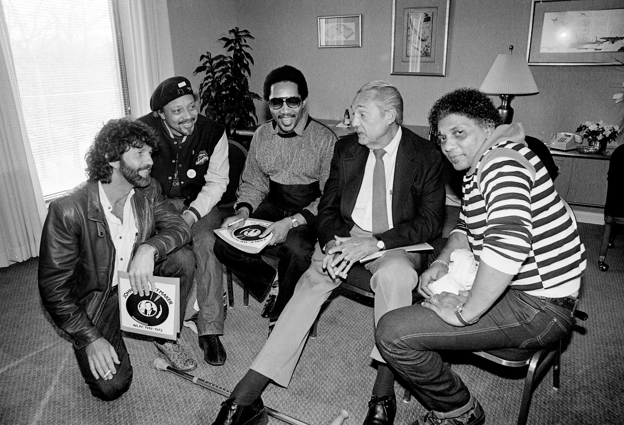 WLAC rhythm & blues veteran Hoss Allen, second from right, begins planning for the March 26 concert at Opry House to benefit his cancer-stricken radio brother John R. (Richburg) on March 6, 1985. Among the celebrities who joined 