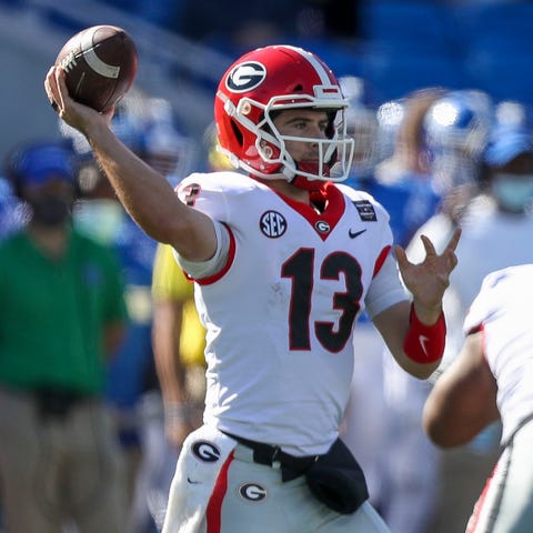 Georgia quarterback Stetson Bennett throws a pass 