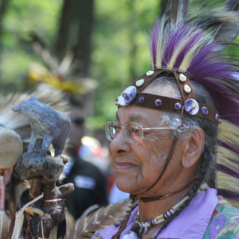 Wampanoag chief Vernon Lopez waits to lead in the 