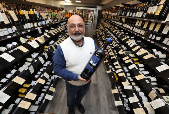 Alpesh Pithadia, owner of Carlo Russo's Wine & Spirit World in Ho-Ho-Kus, NJ. With a Haber Cabernet Sauvignon Nov. 6, 2020.