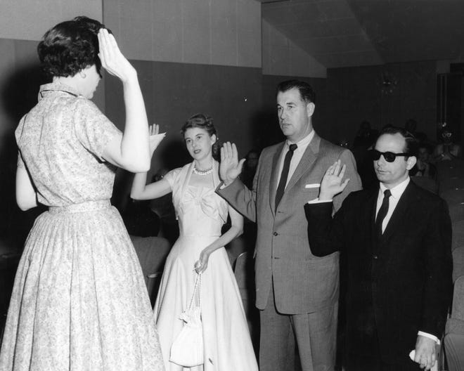 Mary Carlin, Frank Bogert, and George Beebe being sworn in by Palm Springs City Clerk Mary Gene Ringwald on April 16, 1958.