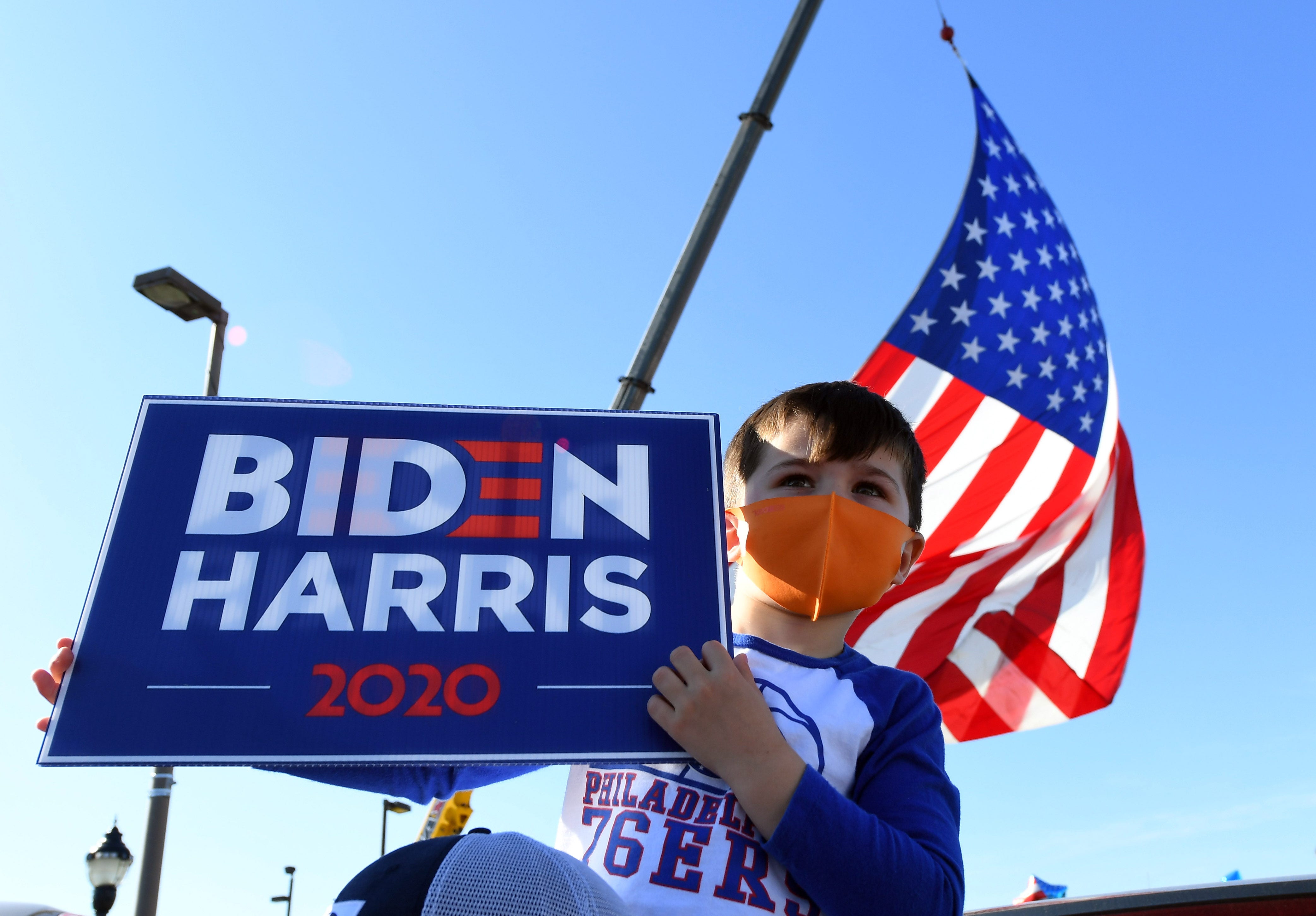 Owen Phelps, 5, shows his support for the president-elect in Wilmington, Delaware.