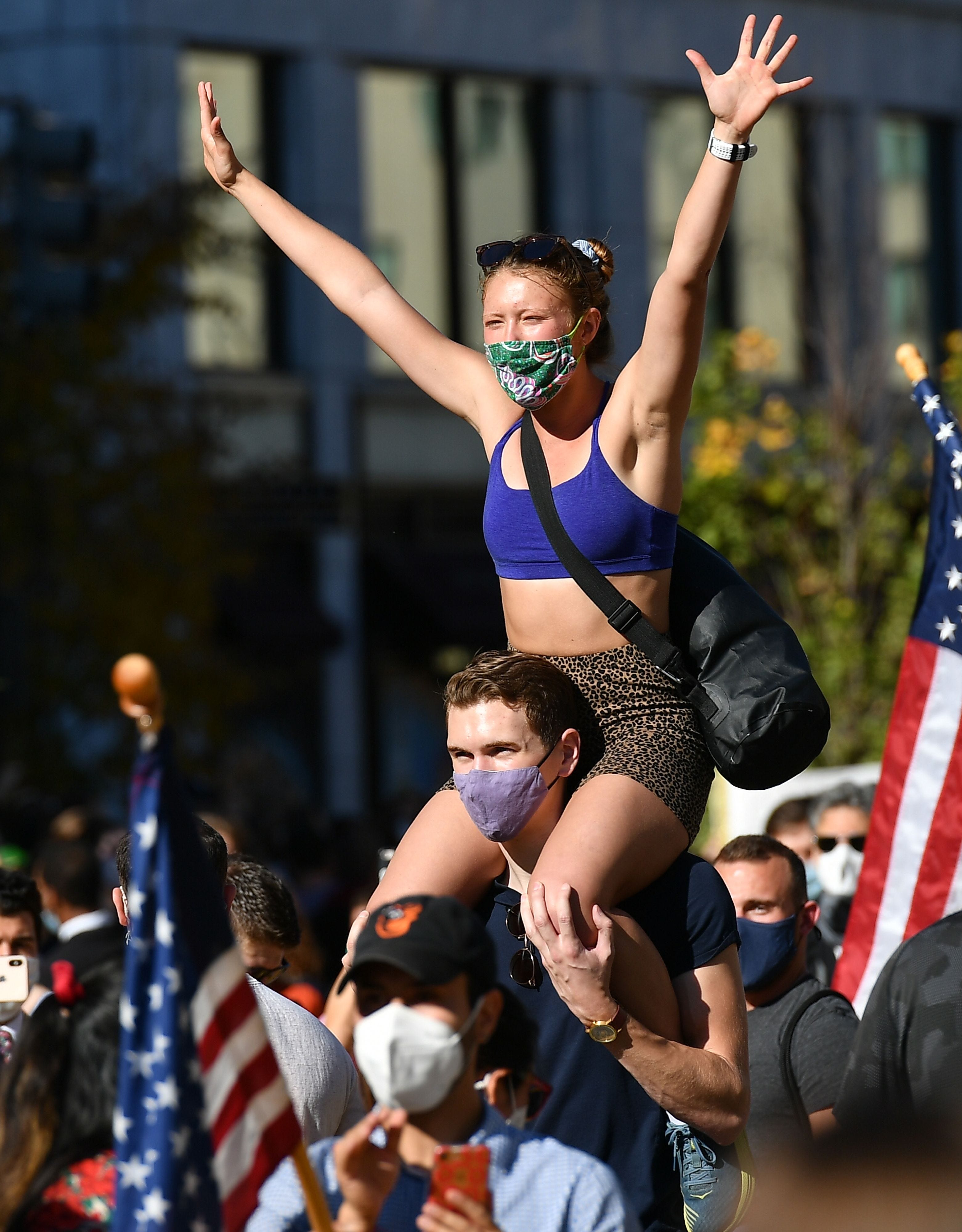 People celebrate on Black Lives Matter Plaza across from the White House in Washington, D.C.