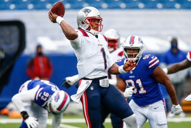 Patriots quarterback Cam Newton launches a pass against the Buffalo Bills on Nov. 1 in Orchard Park, N.Y. [John Munson/Associated Press]