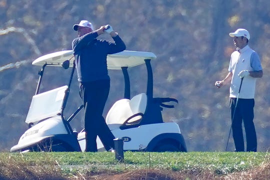 President Donald Trump plays a round of golf at the Trump National Golf Club in Sterling Va., Sunday, Nov. 8, 2020.