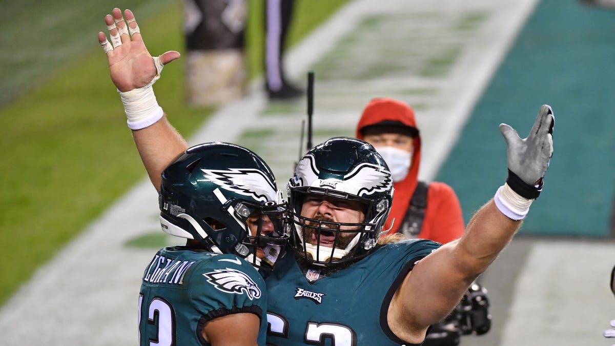Philadelphia Eagles wide receiver Travis Fulgham (13) celebrates his touchdown with center Jason Kelce (62) against the Dallas Cowboys during the third quarter at Lincoln Financial Field.