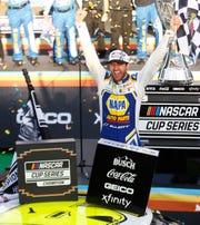 Chase Elliott celebrates winning the 2020 NASCAR Cup Series after winning the Season Finale 500 at Phoenix Raceway in Phoenix, Ariz. on Nov. 8, 2020. 