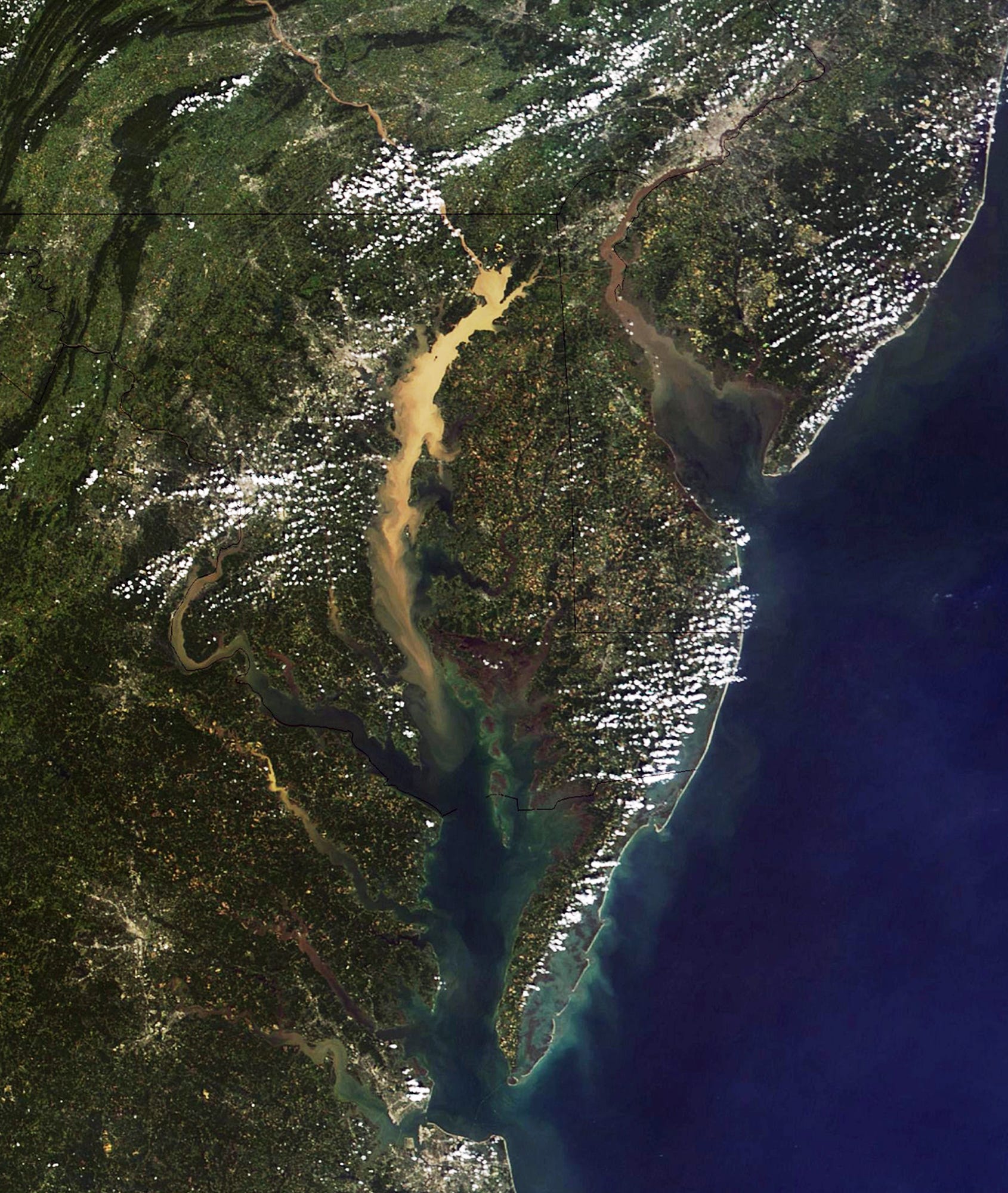 Plumes of sediment turned the water brown in both the Chesapeake and Delaware bays after Tropical Storm Lee in 2011.