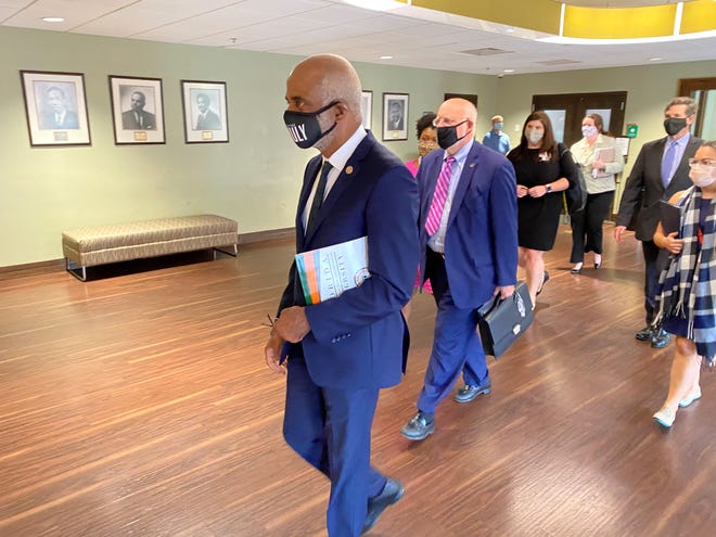 FAMU President Larry Robinson (left), leads Dr. Robert Redfield, director of the Centers for Disease Control, inside the Grand Ballroom Monday to discuss COVID-19-related issues. Redfield visited FSU Monday morning.
