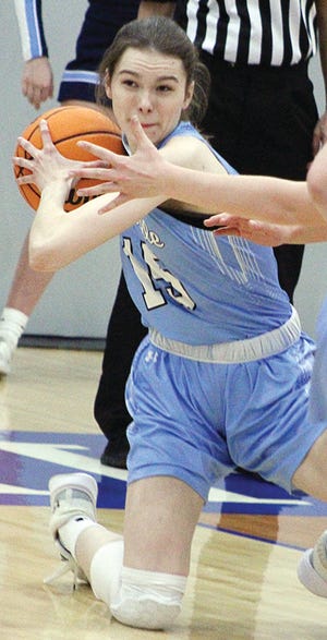 Ragen Hodge hustles for the ball during action last season for the Bartlesville High School girls basketball team. Hodge is back this year for her junior campaign.