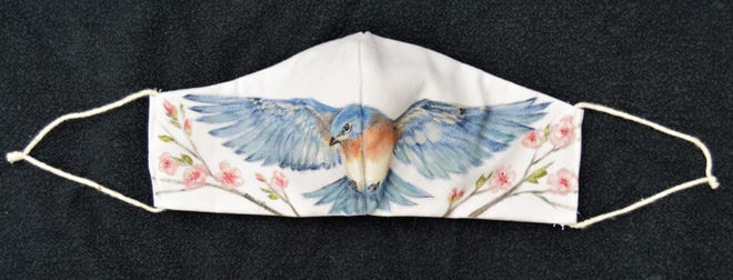 Chris O'Dell-Ferguson's Bluebird with Blossoms is part of "The UnMasked Project" connected to the pandemic.