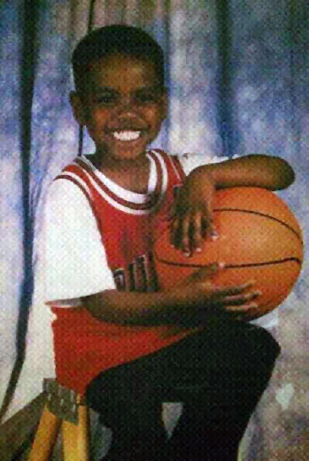 Jarvis Ragland showed an early interest in basketball in this childhood photo from second grade at Lee Elementary School. Ragland would later go on to play basketball at the University of Wisconsin-Stout.