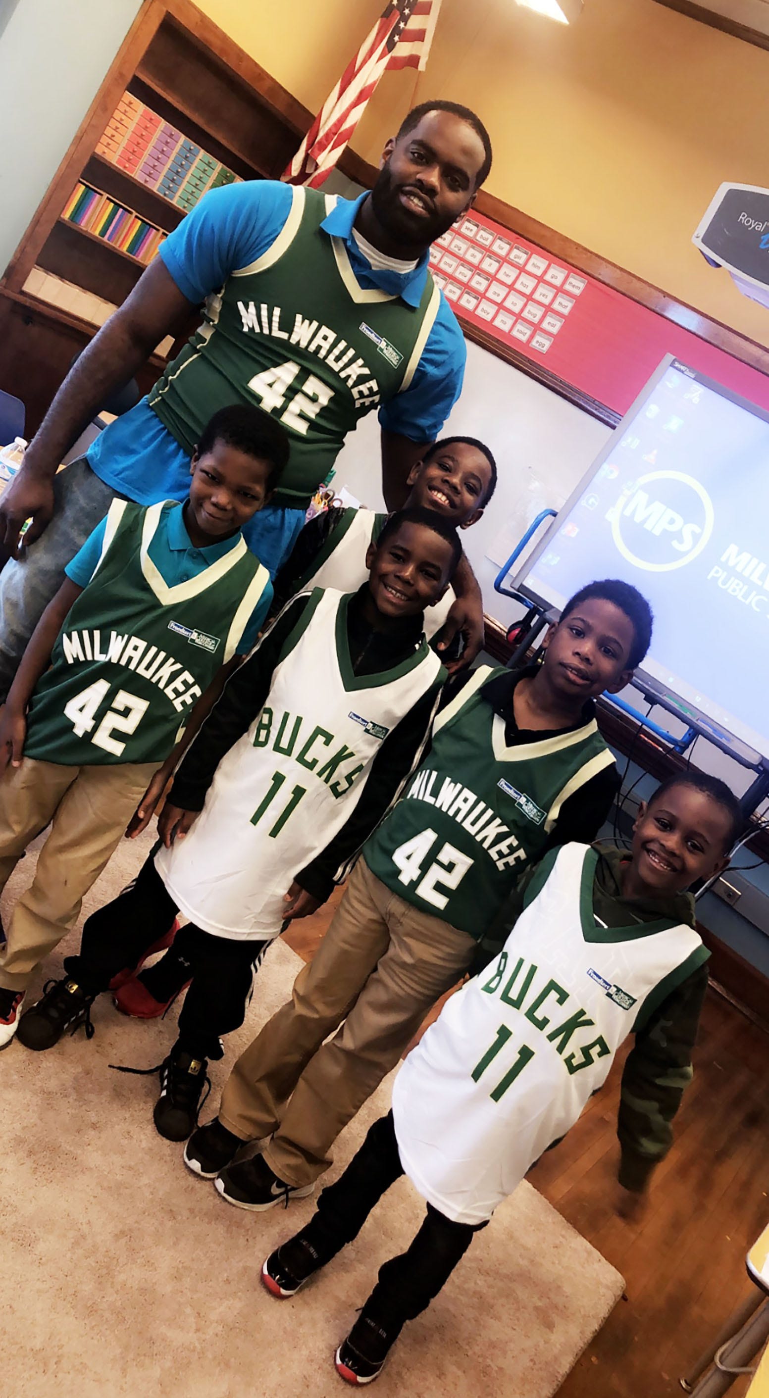 Jarvis Ragland poses for a photo with his students at Lloyd Barbee Montessori School this year. Ragland has since transferred to Marvin E. Pratt Elementary School, where he is a special education resource teacher.