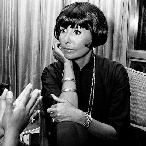 Songstress Lena Horne, right, talks with a friend 