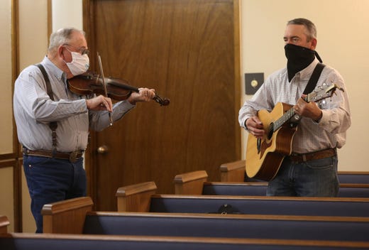 Family and friends gather at Getz Funeral Home in Las Cruces on Friday Nov. 6, 2020, for a funeral for Thomas Mobley Jr. Mobely died Monday from complications due to COVID-19.