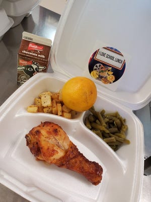 A baked chicken meal with potatoes and green beans is one of the school lunches offered to any local child through a Farmington Municipal School District program.