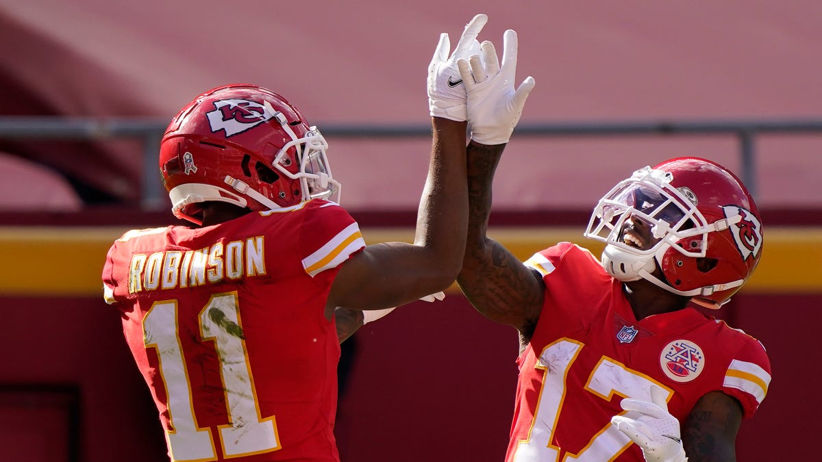 Kansas City Chiefs wide receiver Demarcus Robinson (11) celebrates after scoring a touchdown against the Carolina Panthers with wide receiver Mecole Hardman (17) during the first half of an NFL football game in Kansas City, Mo., Sunday, Nov. 8, 2020.