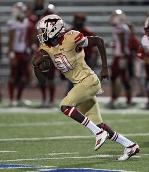 Coronado defensive back Imari Jones (31) returns an interception for a touchdown during a September 2019 game against Odessa at PlainsCapital Park/Lowrey Field. Jones, who was credited with 15 passes defended on the Mustangs' 12-win team in 2020, committed Tuesday to Texas Tech.