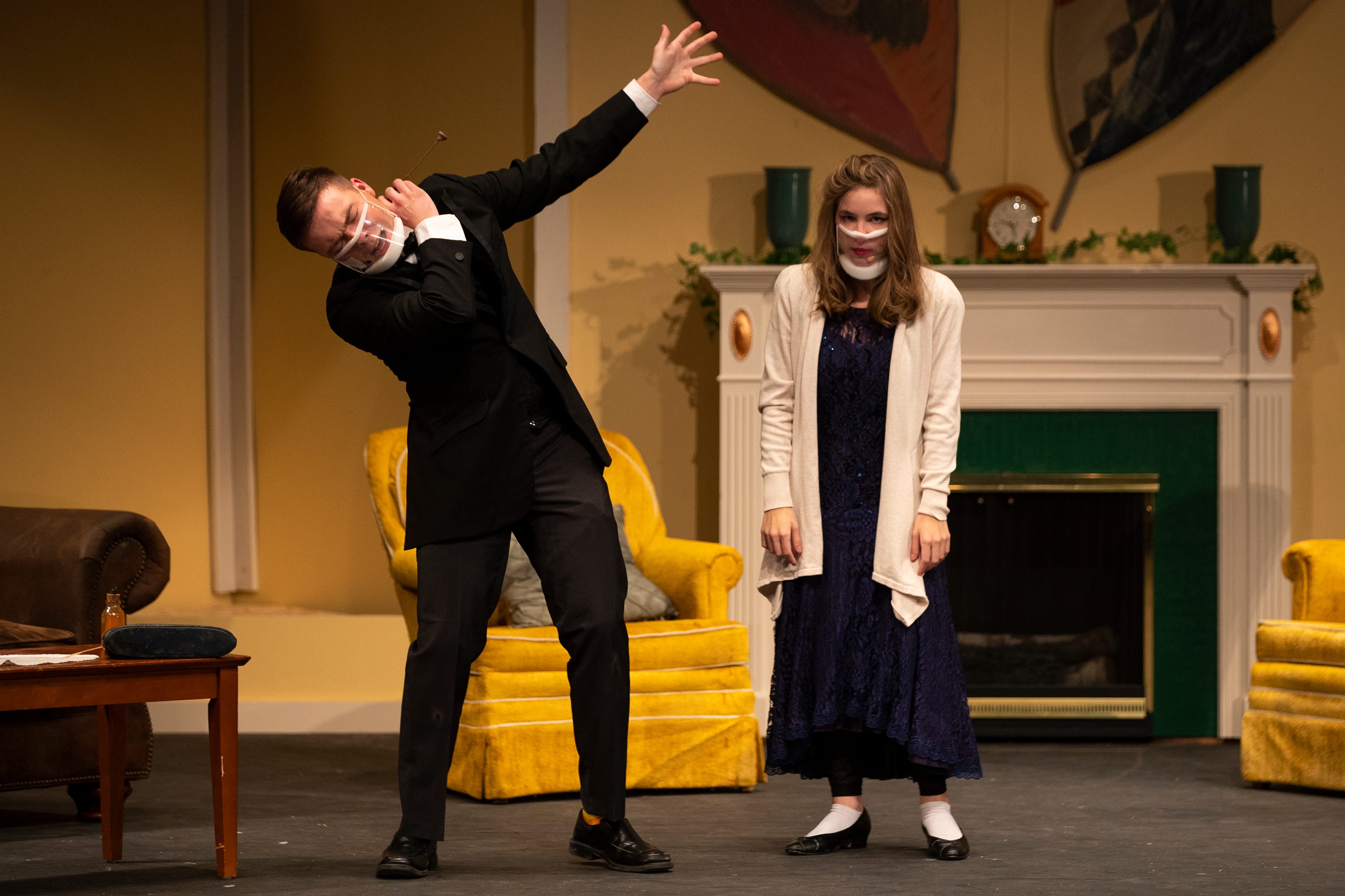 Ryan Rasmussen and Josie Parent rehearse the play "Murder at Rundown Abbey" at Wausau West High School on Tuesday in Wausau.