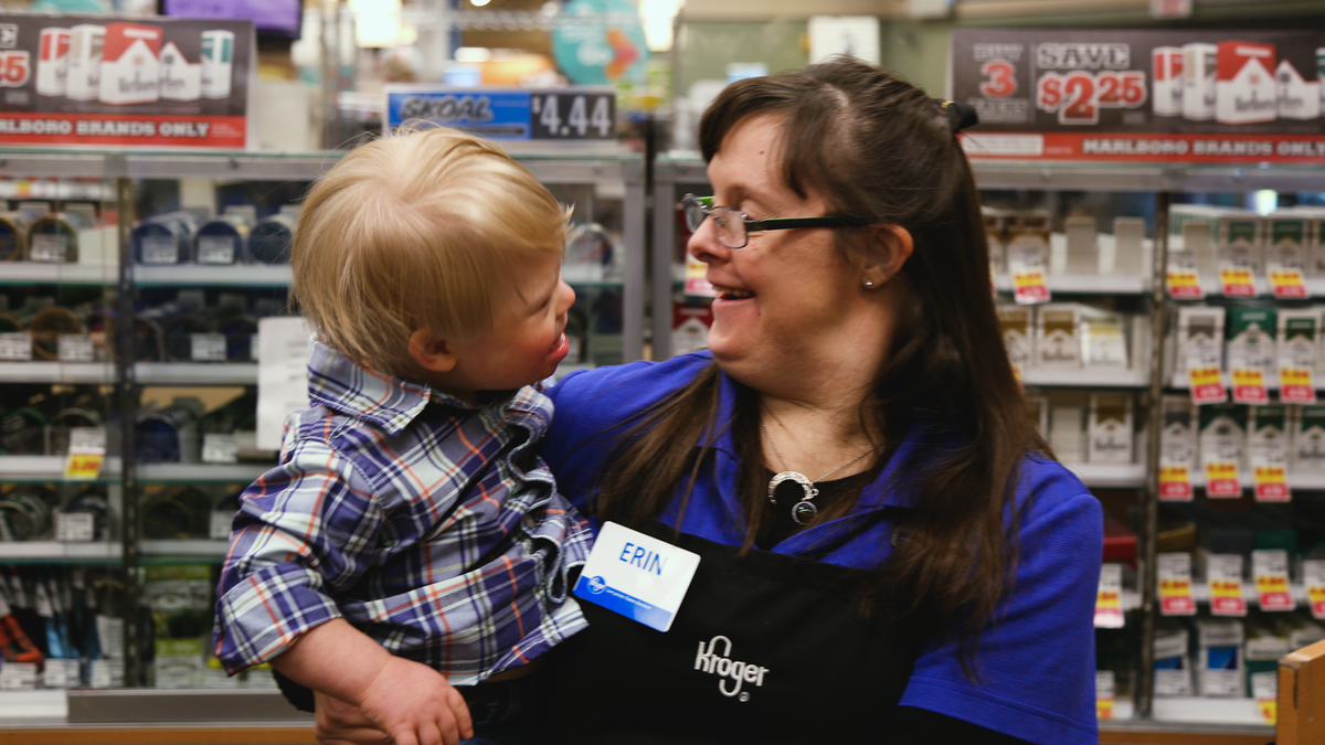 Kroger employee Erin was bagging groceries when she spotted a little boy who also has Down syndrome. Now, Erin is showing Charlie what's possible.