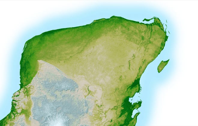 In the upper left portion of the Yucatan Peninsula, seen in this high resolution topographic map created with data collected by NASA, a faint arc of dark green is visible indicating the remnants of the Chicxulub impact crater. The crater was caused by a cataclysmic asteroid impact which, scientist theorize, may have caused the Cretaceous-Paleogene Extinction of most life on Earth, including the dinosaurs, 65 million years ago.